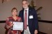 Prof. Andrés Tremante giving Dr. Ma. Dolores García Perea the best paper award certificate of the session "Sistemas/Tecnologías de Información y sus Aplicaciones I." The title of the awarded paper is "Tecnología y Aprendizaje Ubicuo."